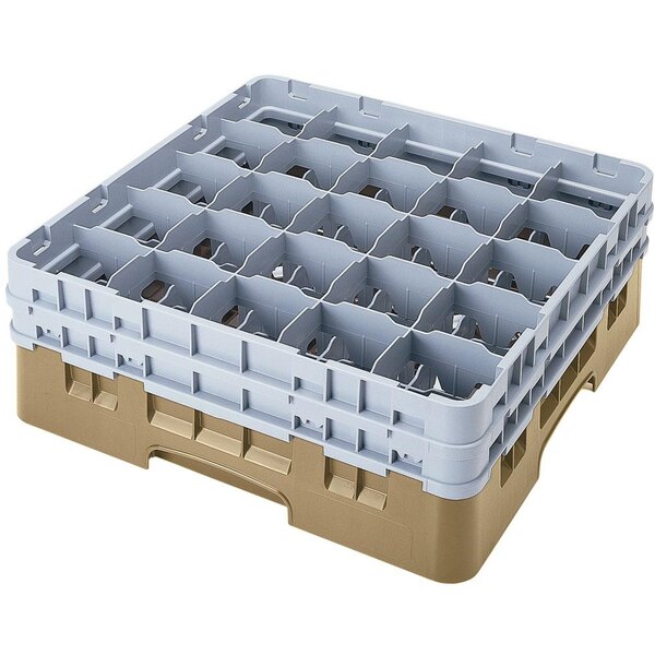A beige plastic crate with holes for 25 glass compartments with 4 extenders.