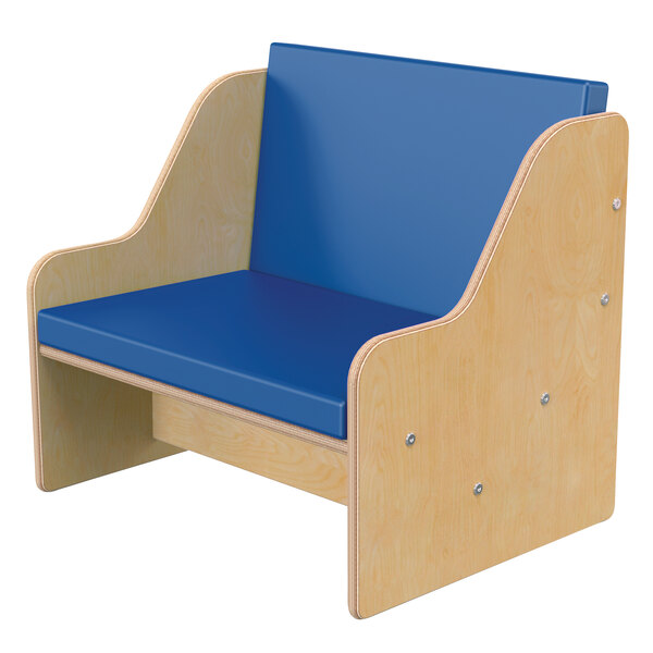 A wooden children's chair with blue padded seating.