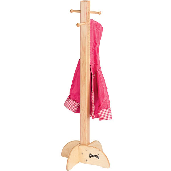 A pink coat hanging on a Jonti-Craft wooden coat tree.