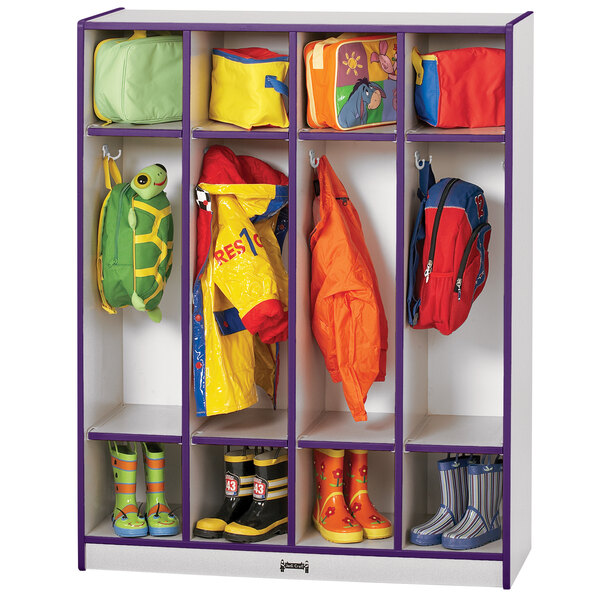 A purple Rainbow Accents coat locker with white and purple storage cabinets holding yellow, blue, green, and red jackets and bags.