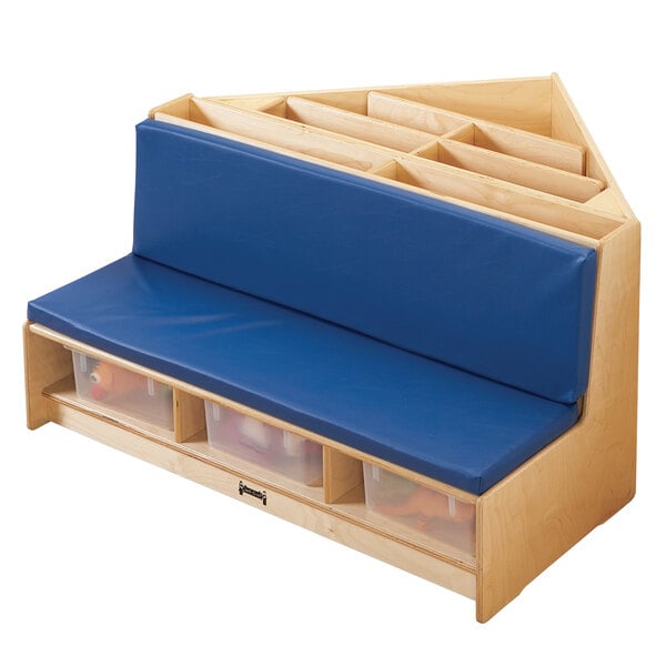 A blue cushioned Jonti-Craft corner bench with storage bins.