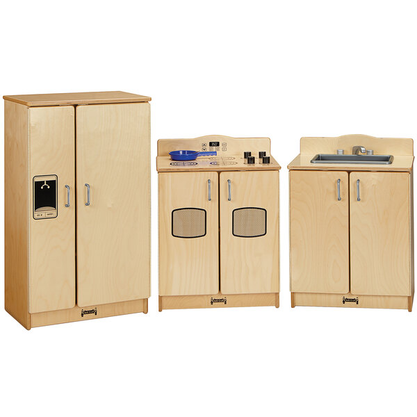A Jonti-Craft wooden kitchen set with cabinets and a sink.