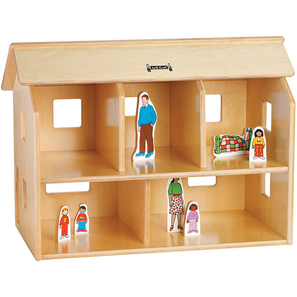 A Jonti-Craft wooden doll house with cutouts for toys.