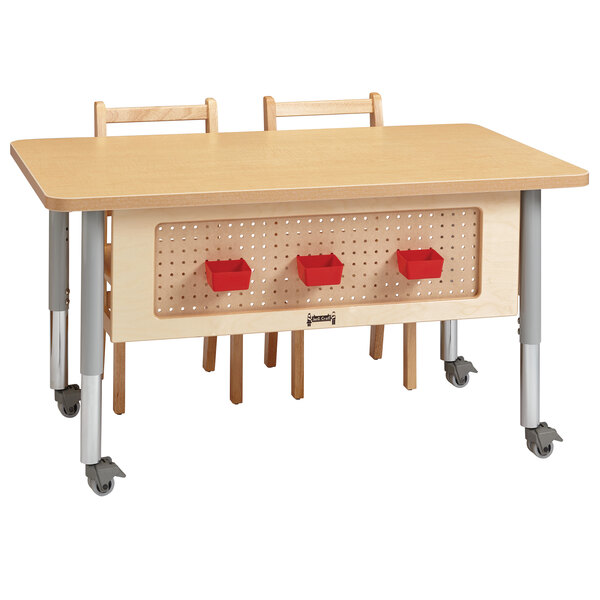 A Jonti-Craft children's STEM table with a pegboard modesty panel.