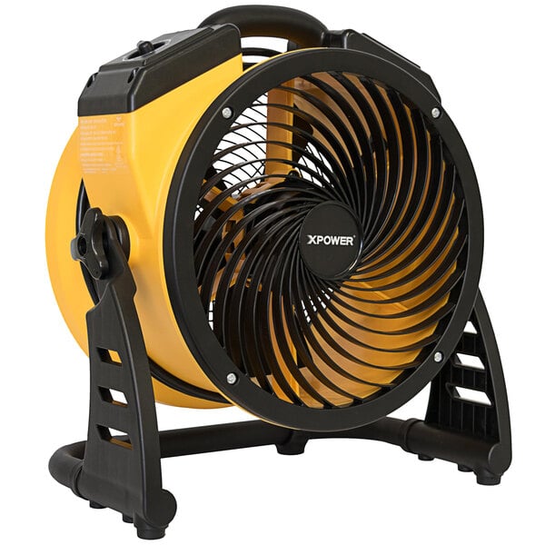 A yellow and black XPOWER FC-100 utility fan on a stand.