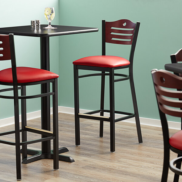 Lancaster Table & Seating Mahogany Finish Bar Height Bistro Chair with 2" Red Padded Seat