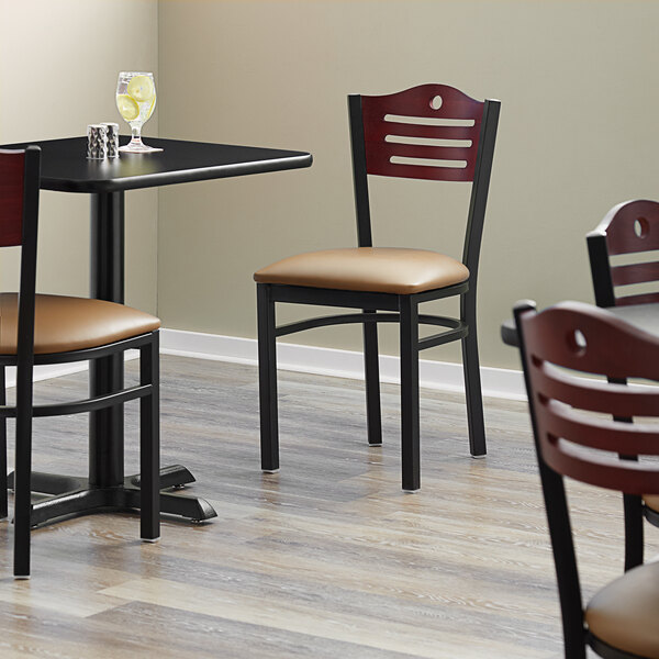 Lancaster Table & Seating Black Finish Bistro Chair with 2 1/2" Light Brown Vinyl Padded Seat and Mahogany Wood Back