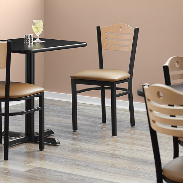 Lancaster Table & Seating Black Finish Bistro Chair with 2 1/2" Light Brown Vinyl Padded Seat and Natural Wood Back