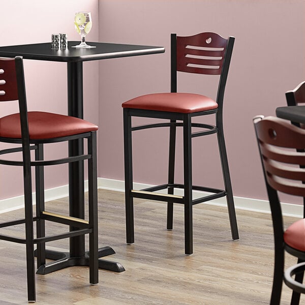 Lancaster Table & Seating Black Finish Side Bar Stool with Burgundy Vinyl Seat and Mahogany Wood Back - Detached Seat