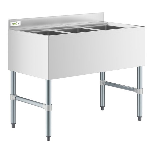 A stainless steel Regency underbar sink with three compartments.