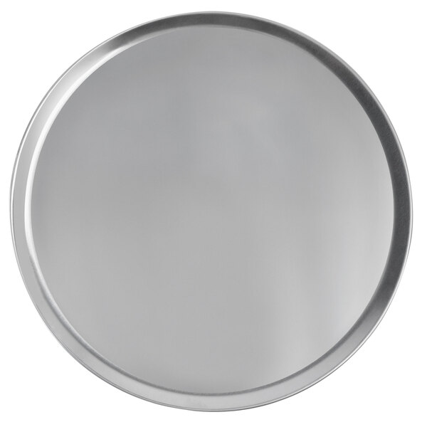A round silver Vollrath pizza pan with a silver rim.