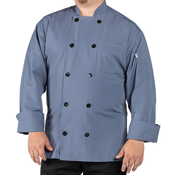 A man wearing a Uncommon Chef long sleeve chef coat with 10 buttons.