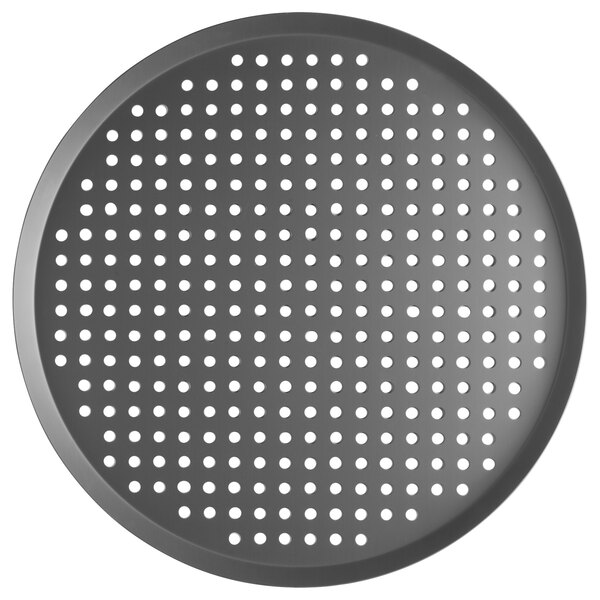 A black Vollrath round pizza pan with holes.