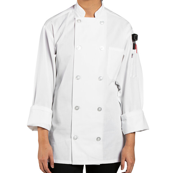A person wearing a Uncommon Chef white long sleeve chef coat with buttons.