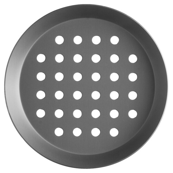 A round black Vollrath heavy weight aluminum pizza pan with holes.