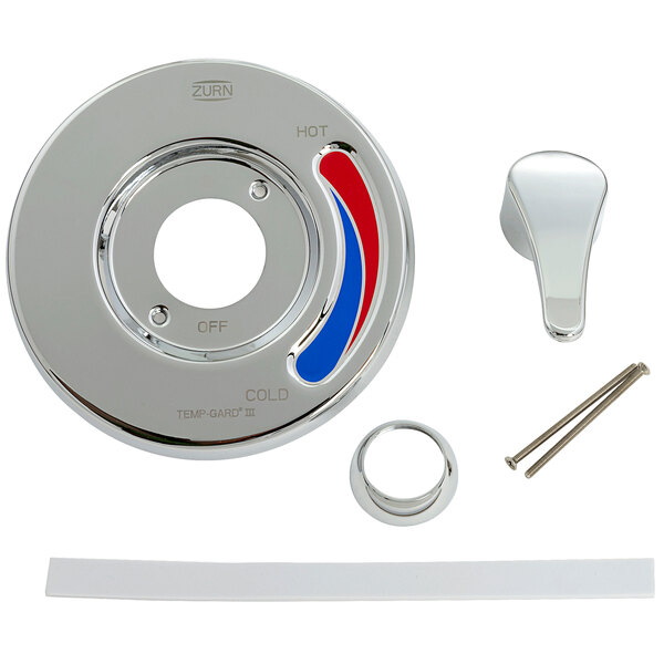 A circular metal Zurn trim kit with a white object and red and blue stripes.