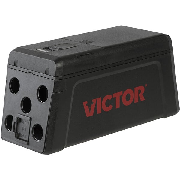 A black rectangular Victor electronic rat trap with four red buttons.