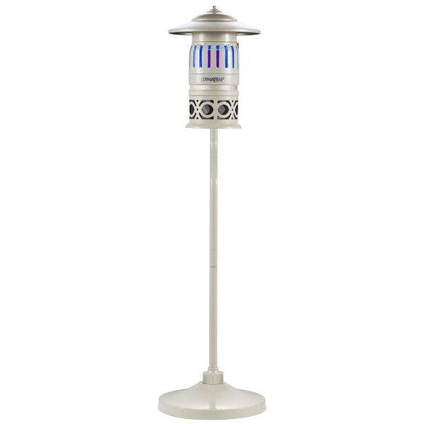 A white pole with a round blue light on top.