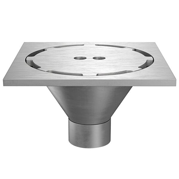 A Zurn stainless steel floor drain with a circular hole and heavy-duty perimeter grate.