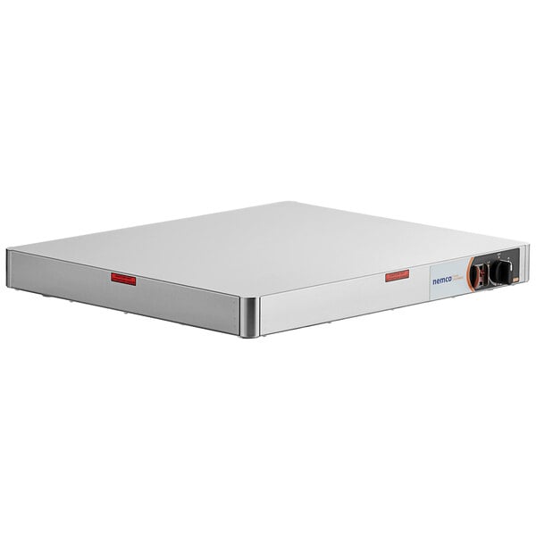 A white rectangular Nemco heated shelf warmer with stainless steel sides.