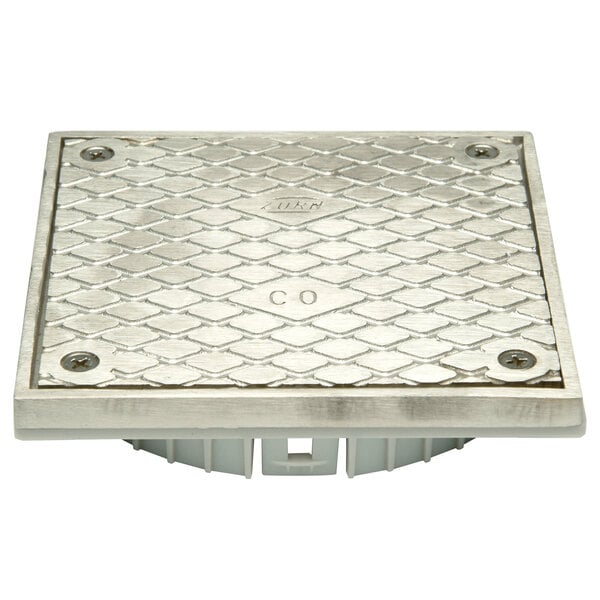 A metal Zurn square with holes and screws on a white background.