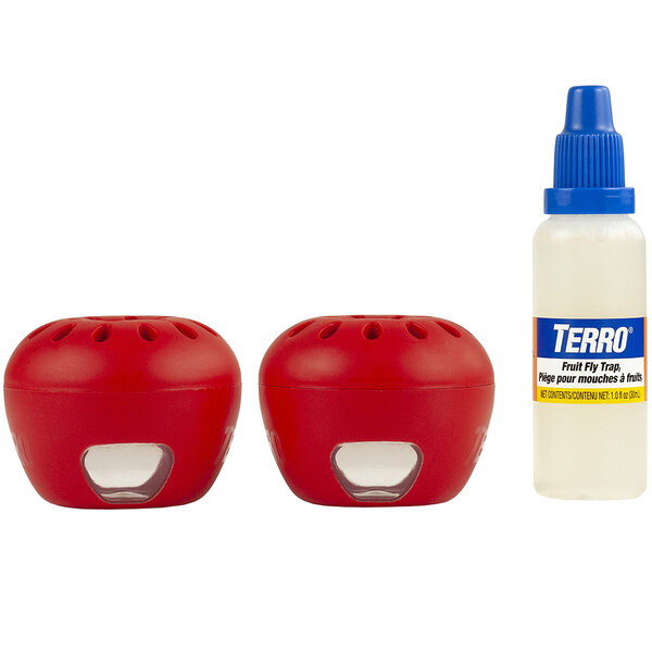 Two red Terro fruit fly containers with a blue bottle next to them.