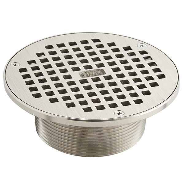 A Zurn polished nickel bronze round drain grate with heel-proof square openings.