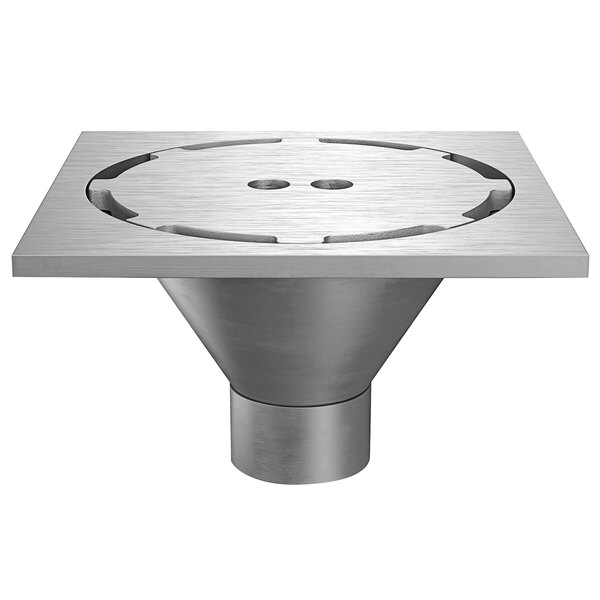 A Zurn stainless steel floor drain with a circular hole.