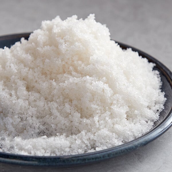 A plate of Regal Spanish Natural Flower of Salt on a table.