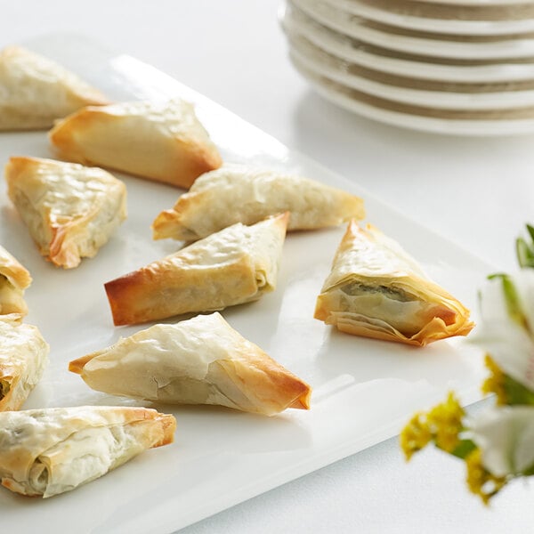 A plate with Les Chateaux de France Greek Spanakopita on it.