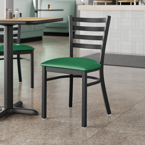 Lancaster Table & Seating Black Finish Ladder Back Chair with 2 1/2" Green Vinyl Padded Seat - Assembled