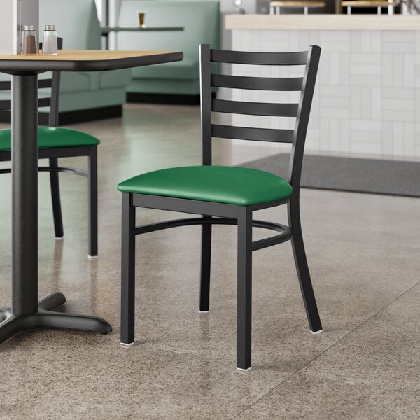 Lancaster Table & Seating Black Finish Ladder Back Chair with 2 1/2" Green Vinyl Padded Seat - Detached
