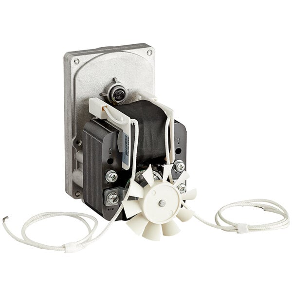 A close-up of a small metal Avantco driving motor with wires.