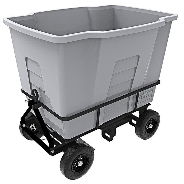 A large grey Toter industrial waste receptacle on wheels.