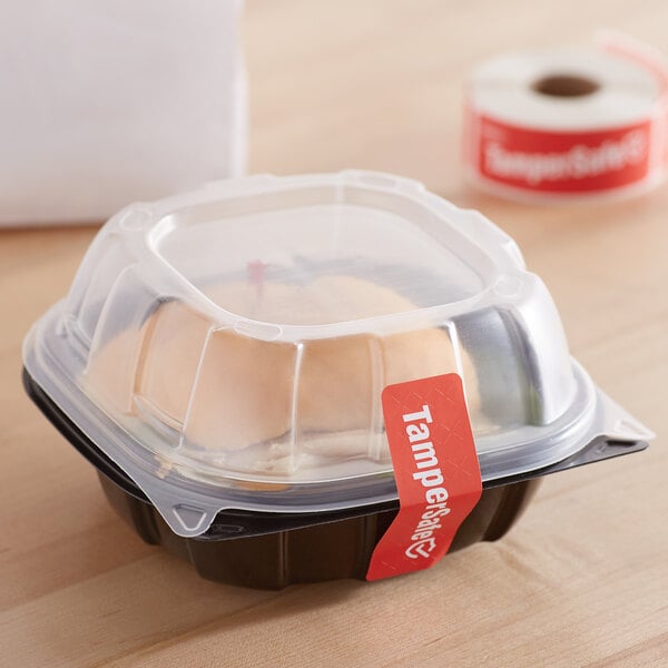A plastic container with a red TamperSafe label on it.