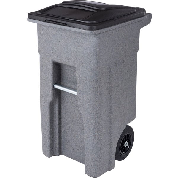 A gray Toter rectangular trash can with a black lid.
