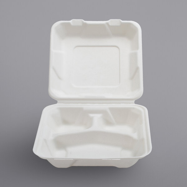 A white bagasse take-out container with three compartments.
