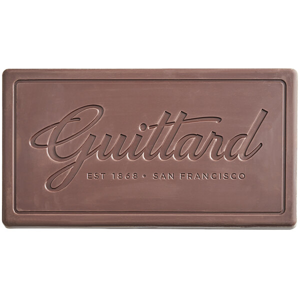 A Guittard Solitaire 54% Dark Chocolate Bar on a table.