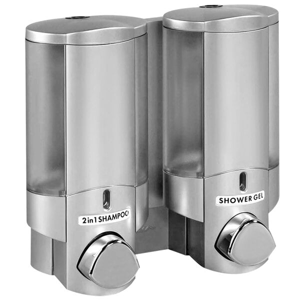 A satin silver wall mounted Dispenser Amenities Aviva 2-chamber soap dispenser with translucent bottles.