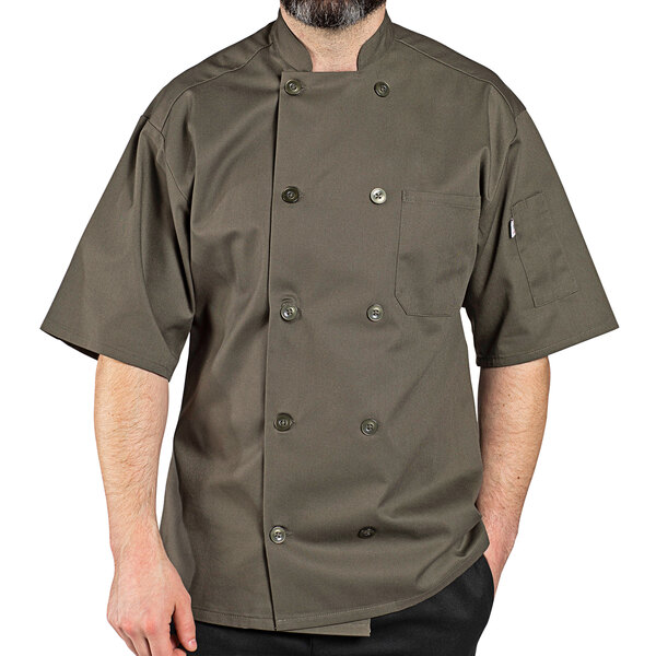 A man wearing an Uncommon Chef olive short sleeve chef coat with a beard.