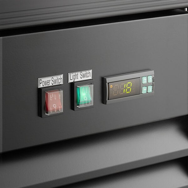 The front of a black Avantco ice merchandiser with a digital temperature display.