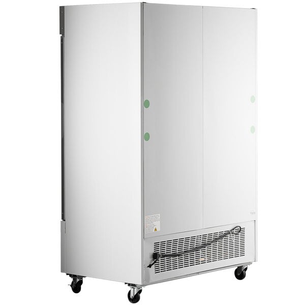 An Avantco white ice merchandiser with a glass door and wheels.