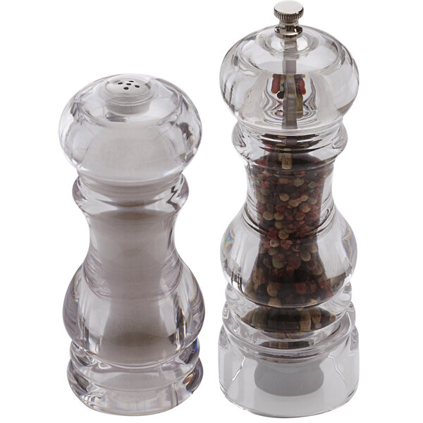 An American Metalcraft salt and pepper mill set with a white top on the salt shaker.