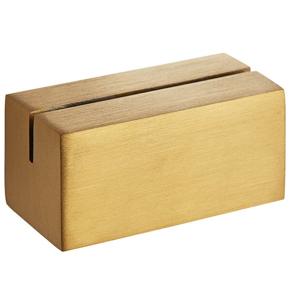 A gold rectangular Front of the House brushed stainless steel card holder with two holes.