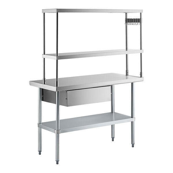 A stainless steel work table with an undershelf, two upper shelves, a drawer, and a pot rack on the right side.