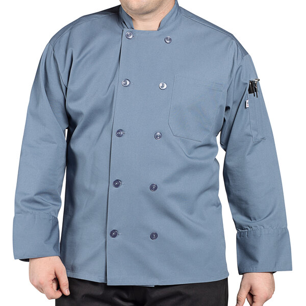 A man wearing a Uncommon Chef steel long sleeve chef coat.