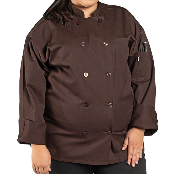 A plus size woman wearing a Uncommon Chef Orleans brown chef coat.