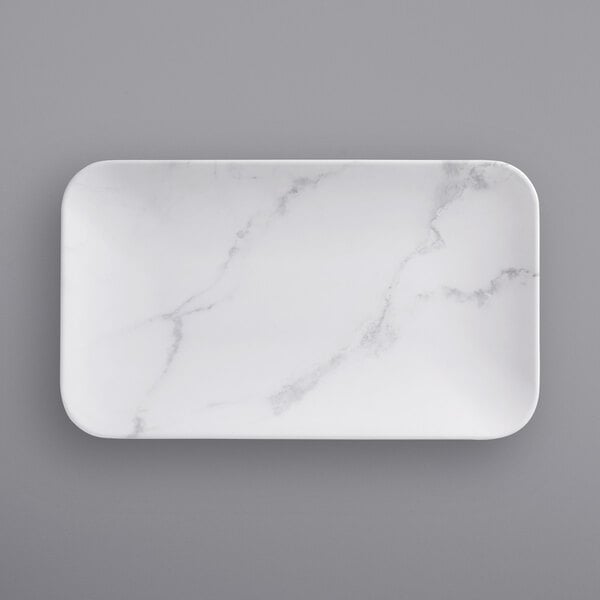 An American Metalcraft white rectangular melamine platter with a marble pattern.