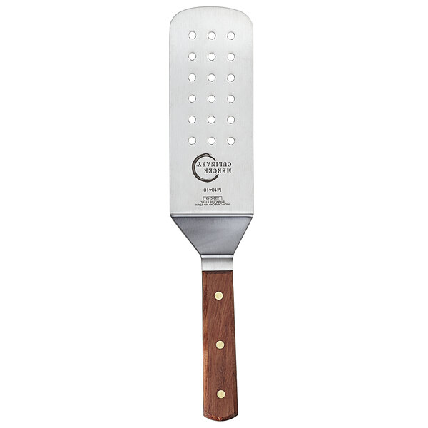 A Mercer Culinary Praxis stainless steel turner with a rosewood handle.