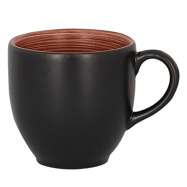 A black RAK Porcelain cup with a brown rim and handle.